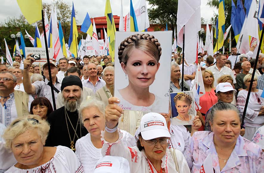 Opposition activists take part in a rally as they mark the 22th anniversary of Ukraine`s independence from the Soviet Union and protest the arrest of former Prime Minister Yulia Tymoshenko in Kiev, Ukraine.