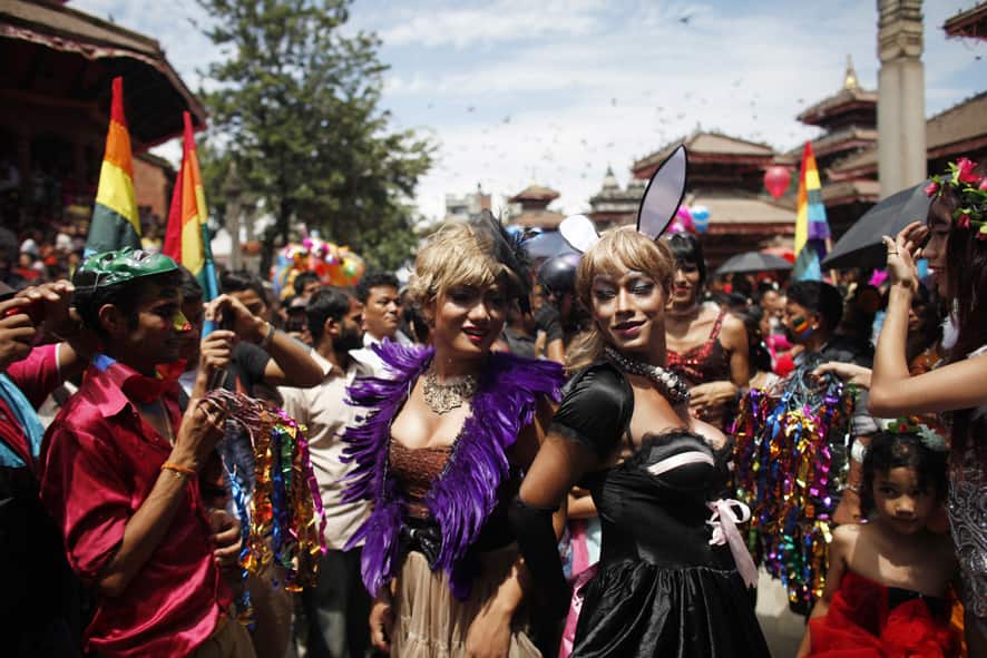 Participants dance in a Gay Pride rally in Katmandu, Nepal. About 1,000 people, including gays, lesbians, transvestites and their supporters hold the rally that has now become an annual festival for sexual minorities to celebrate and to demand rights for their community.
