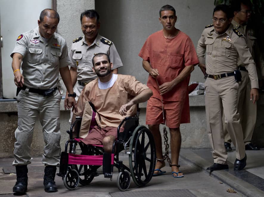 Two Iranian suspect bombers, Saeid Moradi and Mohammad Kharzei leave the criminal court in Bangkok, Thailand. A Thai court sentenced Moradi to life in prison for attempting to murder a police officer and possessing explosives that damaged property and injured several civilians.