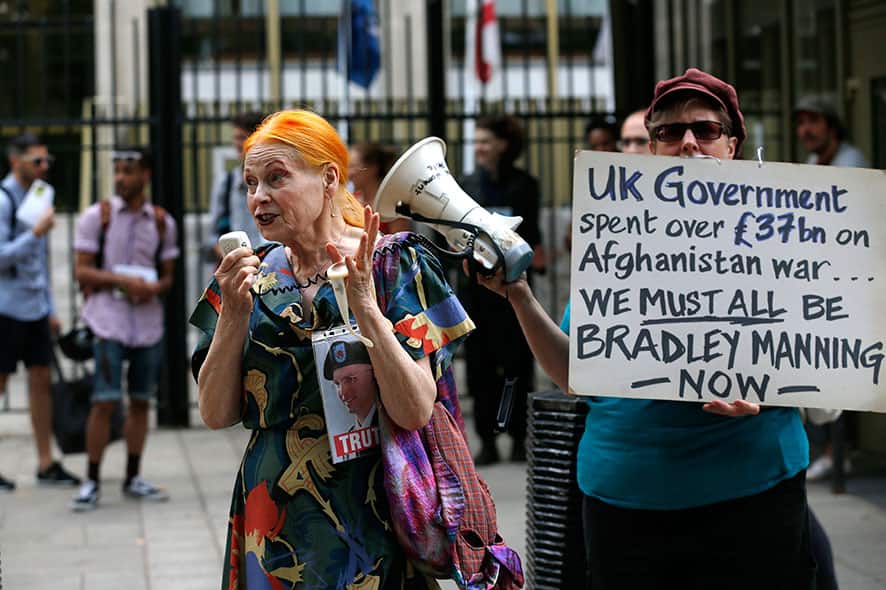 Supporter of US army Pfc Bradley Manning, British fashion designer Vivienne Westwood, left, addresses the protesters outside the US Embassy in London.