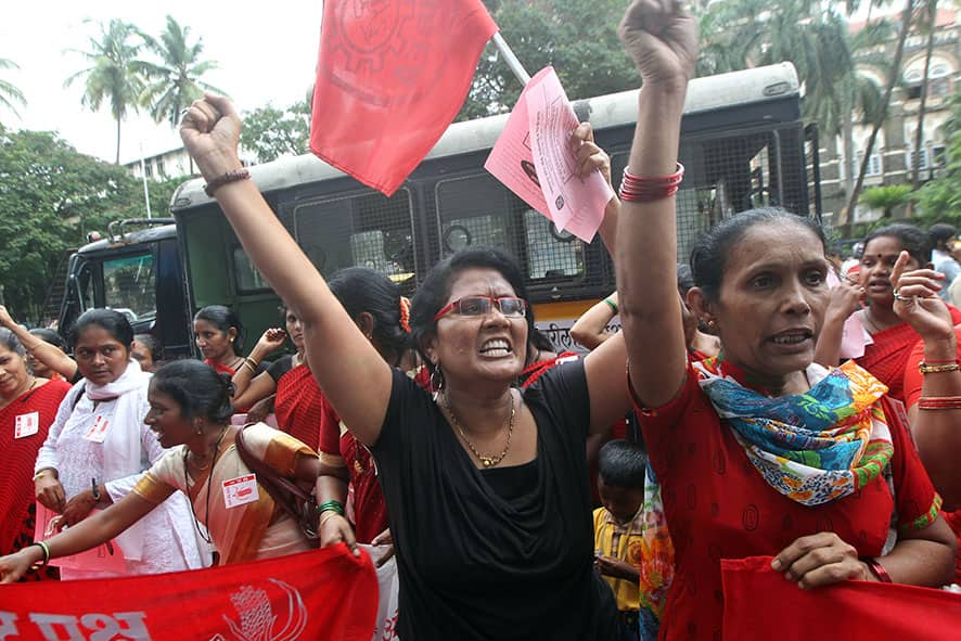 Women shout slogans during a protest against the killing of social activist Narendra Dabholkar in Mumbai.