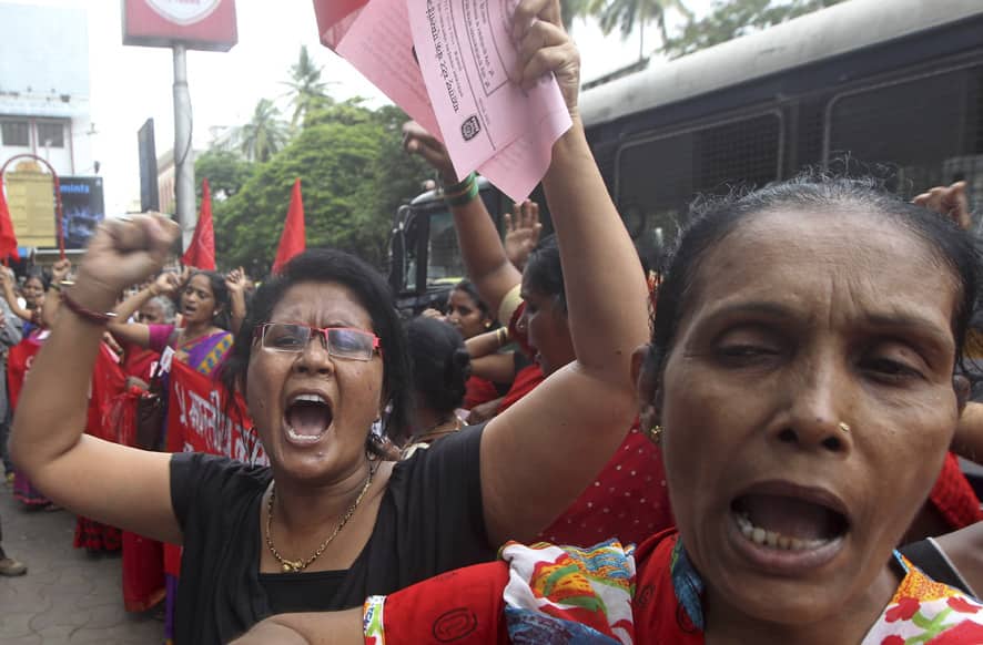 Women shout slogans during a protest against the killing of social activist Narendra Dabholkar in Mumbai.
