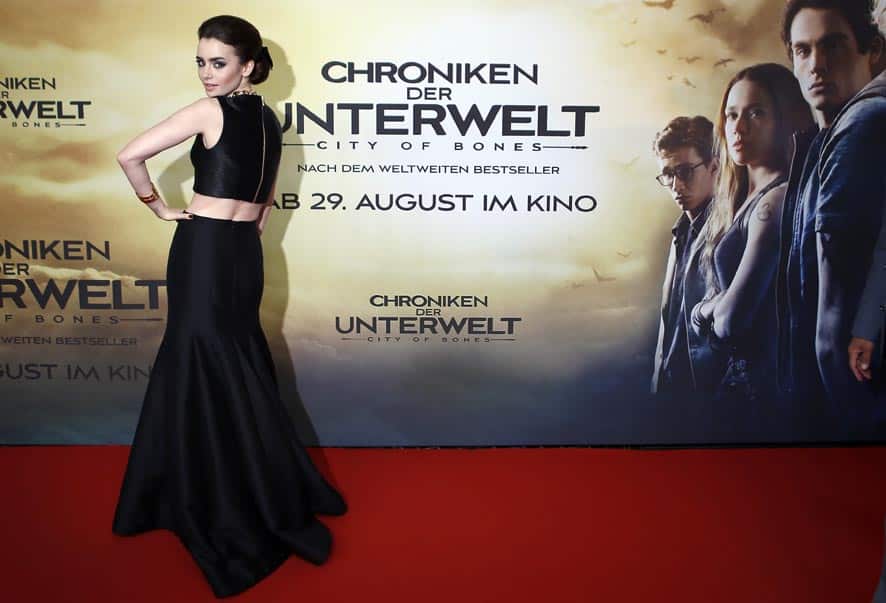 British actress Lily Collins poses for the media during her arrival for the Germany premiere of the movie