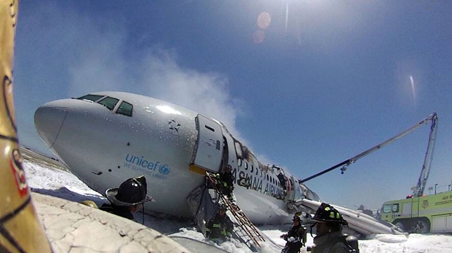 This photo provided by the San Francisco Chronicle shows an image from the helmet-mounted video camera of a San Francisco fire battalion chief at the scene of the crash of Asiana Flight 214 at San Francisco International Airport on July 6, 2013 in San Francisco, Calif.