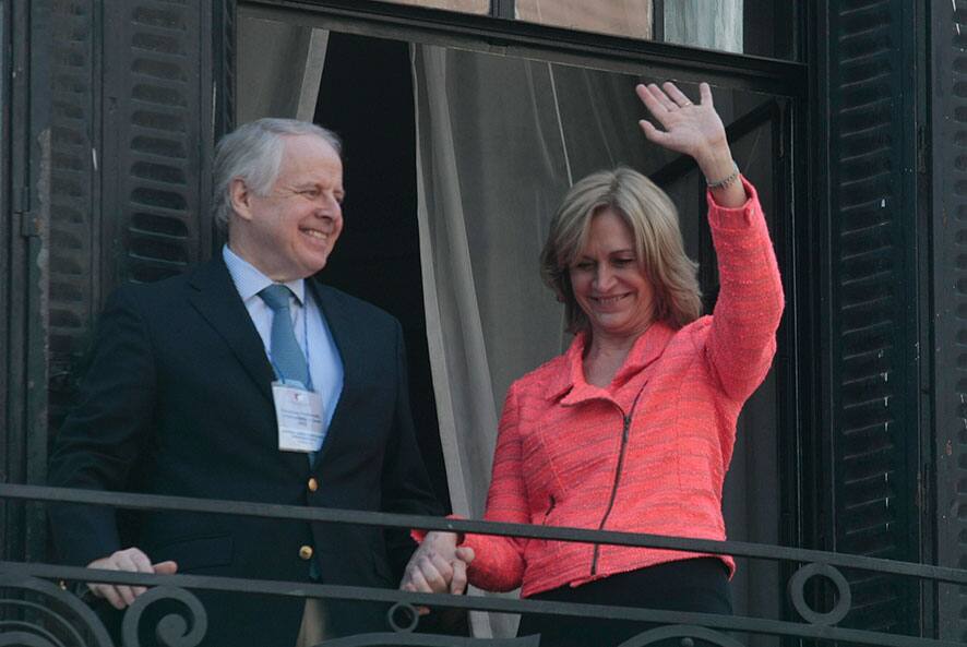 Chile`s presidential candidate Evelyn Matthei, right, and her husband Jorge Desormeaux, greet their supporters after officially registering her candidacy in Santiago, Chile.