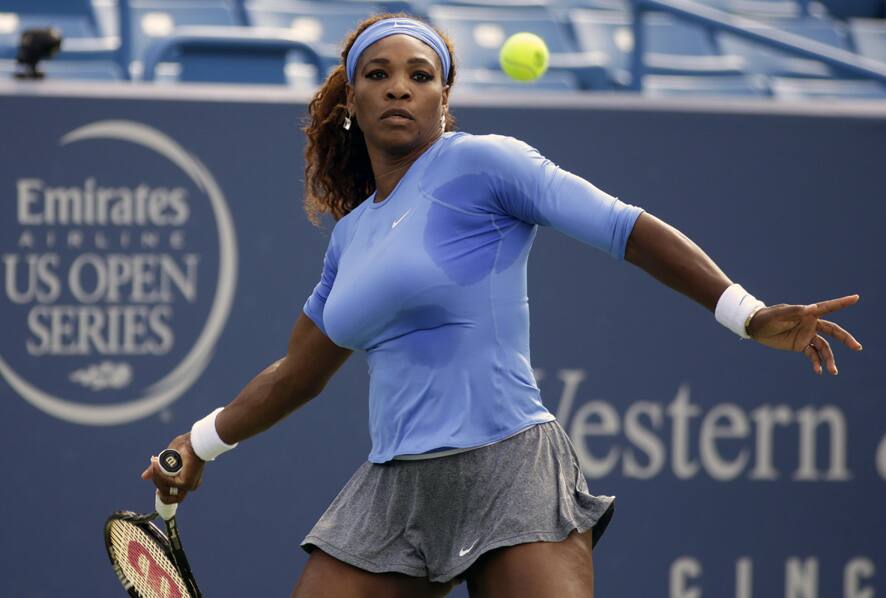 Serena Williams eyes a forehand during a quarterfinal match against Simona Halep, from Romania, at the Western & Southern Open tennis tournament in Mason, Ohio. Williams won 6-0, 6-4.