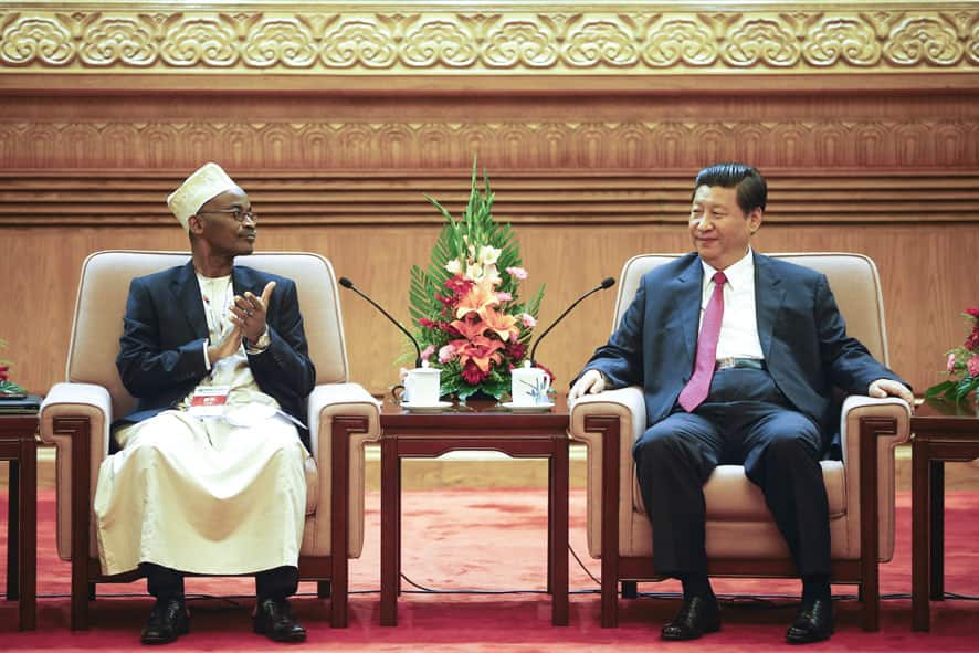 Vice President of the Comoros Fouad Mohadji, left, claps after Chinese President Xi Jinping`s introduction during their meeting prior to the opening of the Ministerial Forum of China-Africa Health Development in Beijing, China.