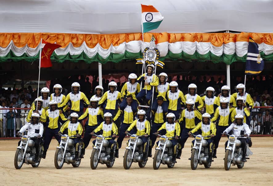 A group of army personnel perform on motorcycles during a function to mark India`s Independence Day in Bangalore.