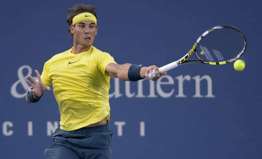 Rafael Nadal, from Spain, hits a forehand to Grigor Dimitrov, from Bulgaria, at the Western & Southern Open tennis tournament, in Mason