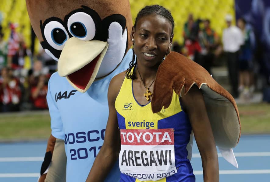 Sweden`s Abeba Aregawi poses with the mascot of the World Athletics Championships as she celebrates her gold medal in the women`s 1500-meter final in the Luzhniki stadium in Moscow, Russia.