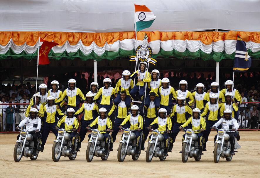 A group of Indian army personnel perform on motorcycles during a function to mark India`s Independence Day in Bangalore.
