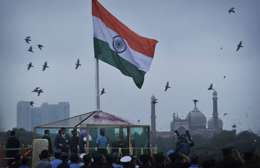 Prime Minister Manmohan Singh unfurls the Indian tricolor from the ramparts of Red Fort to celebrate Independence Day, in New Delhi.
