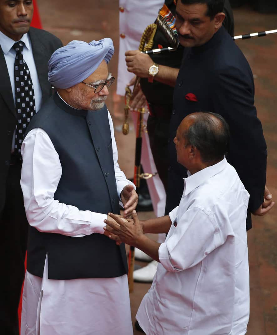 Prime Minister Manmohan Singh, left, talks to Indian Defense Minister A.K Anthony before leaving the Red Fort after addressing the nation to celebrate India`sIndependence Day, in New Delhi.