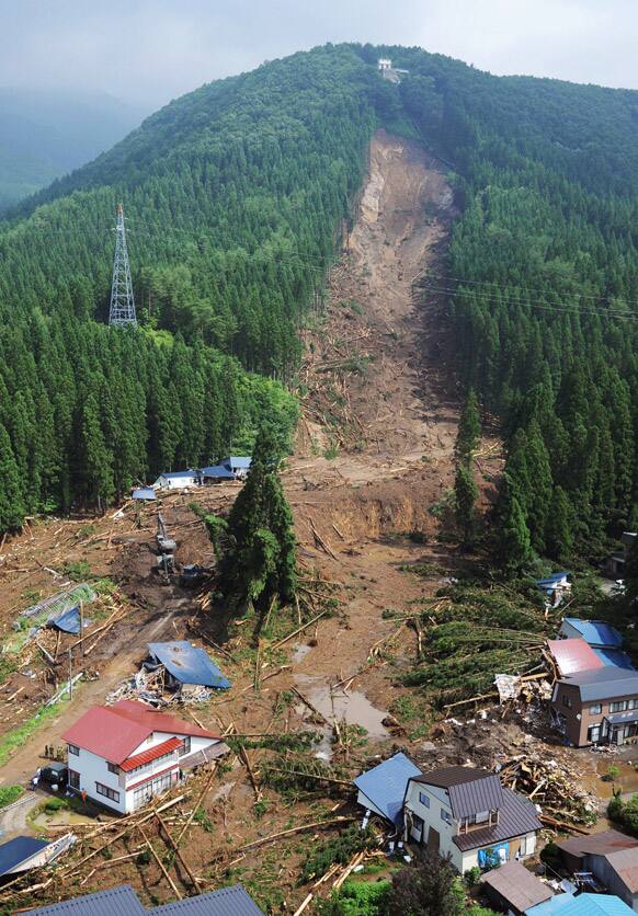 A village is covered by mudslide after heavy rain, in Semboku city, Akita prefecture, northern Japan.