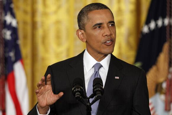 President Barack Obama speaks during a news conference in the East Room of the White House in Washington.