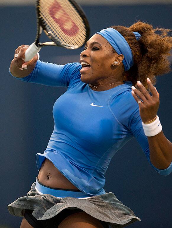 Serena Williams, of the United States, watches a return to Francesca Schiavone, of Italy, during the Rogers Cup women`s tennis tournament in Toronto.