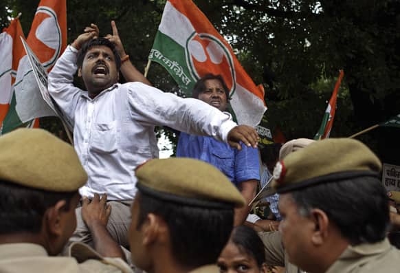 Activists of India`s Congress party`s youth wing shout slogans during a protest against the death of five Indian army soldiers in cross-border exchanges, New Delhi.