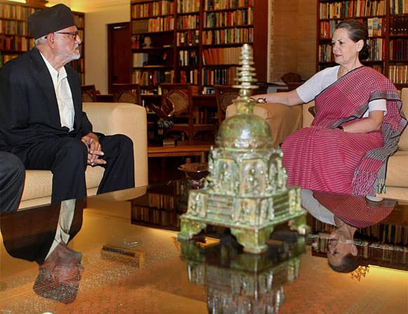 Congress party President Sonia Gandhi sits with Nepali Congress President to India Sushil Kumar Koirala during a meeting in New Delhi.