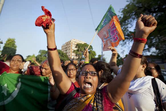 An activist of Bharatiya Janata Party (BJP) shouts slogans during a protest against the death of five Indian army soldiers in cross-border exchanges, in Allahabad.