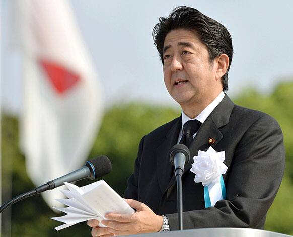 Japan`s Prime Minister Shinzo Abe delivers his speech at the Hiroshima Peace Memorial Park during the ceremony to mark the 68th anniversary of the atomic bombing of Hiroshima, western Japan.
