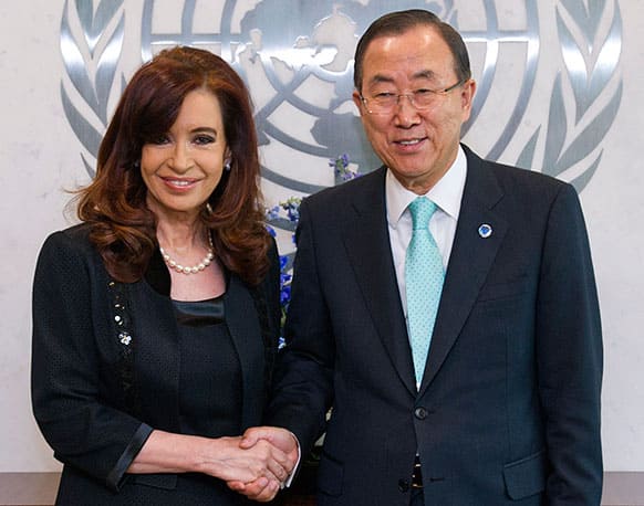 UN Secretary-General Ban Ki-moon poses for a photograph with Argentine President Cristina Fernandez de Kirchner before a meeting at United Nations headquarters.