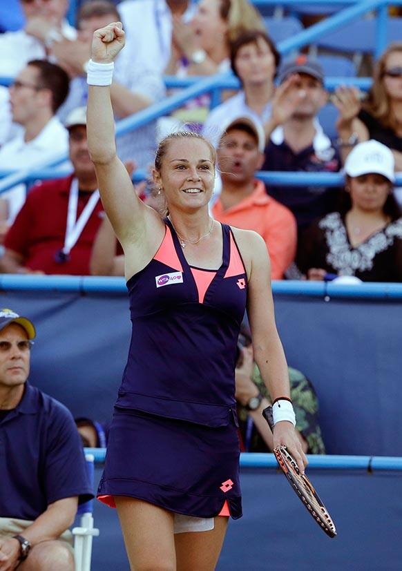 Magdalena Rybarikova, from Slovakia, celebrates after a point during a finals match against Andrea Petkovic, from Germany, at the Citi Open tennis tournament.