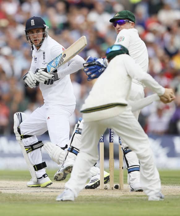 England`s Stuart Broad plays a shot off the bowling of Australia`s Nathan Lyon during day four of the third Ashes Test match held at Old Trafford cricket ground in Manchester, England.
