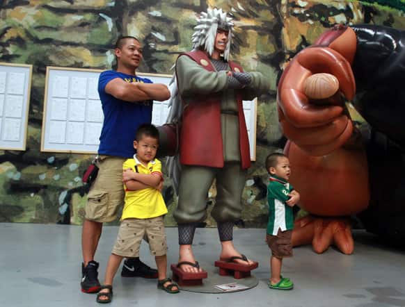 Fans pose for photo at a Japanese ninja animation exhibition