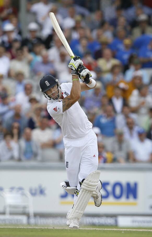 England`s Kevin Pietersen plays a shot off the bowling of Australia`s Nathan Lyon during day three of the third Ashes Test match held at Old Trafford cricket ground in Manchester, England.