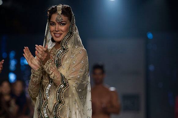 A model displays a creation by designer Monisha Jaising during the Delhi Couture Week in New Delhi, India