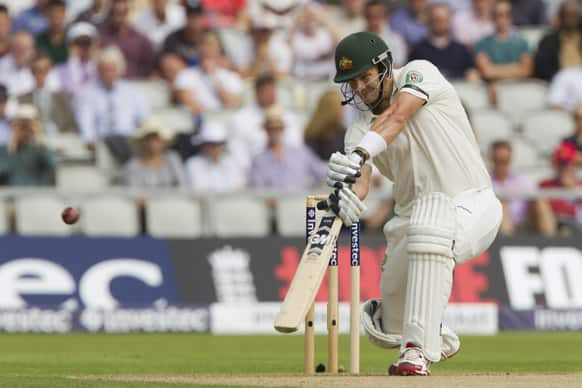 Australia`s Shane Watson plays a shot off the bowling of England`s Stuart Broad, on the first day of the third Ashes series cricket match at Old Trafford cricket ground, Manchester, England.