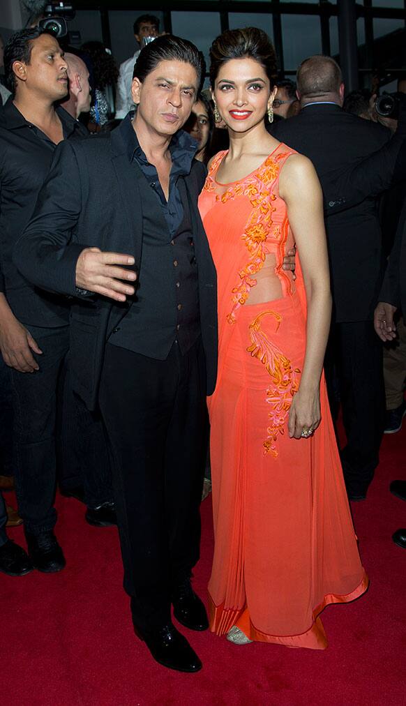 Bollywood actors Shah Rukh Khan and Deepika Padukone attend the UK Premiere of Chennai Express at a cinema in Feltham, Middlesex.
