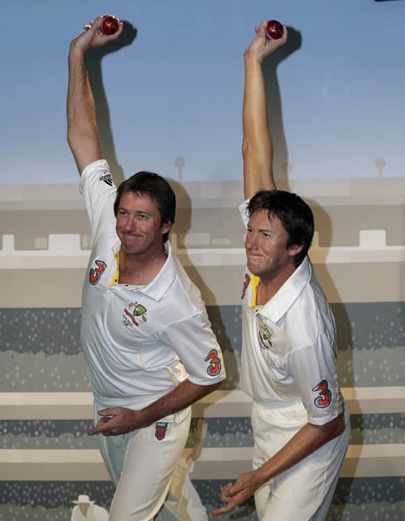 Former Australian cricket player Glenn McGrath, poses next to a wax statue of himself at Madame Tussauds in Sydney. McGrath was voted by the Australia public as their favorite sporting celebrity to be immortalized in wax.