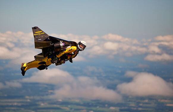In this photo provided by Breitling, Swiss adventurer Yves Rossy, also known as