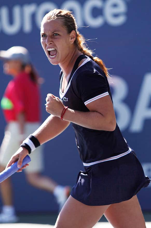 Dominika Cibulkova reacts after winning a point against Agnieszka Radwanska in the finals of the Bank of the West Classic tennis tournament, in Stanford, Calif.