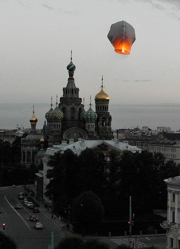 In this aerial photo a paper lantern flies over the Savior of Spilled Blood Cathedral in St. Petersburg, Russia.