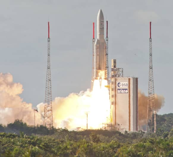 This photo provided by the European Space Agency, an Ariane 5 rocket is launched in Kourou, French Guiana. Arianespace`s heavy-lift launcher orbited Europe`s largest ever telecommunications satellite, Alphasat, and India`s latest meteorological spacecraft, INSAT-3D, on the third Ariane 5 mission of 2013.