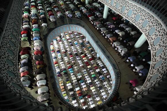 Bangladeshi Muslims offer Friday prayers of Ramadan at Baitul Mukaram national mosque in Dhaka.