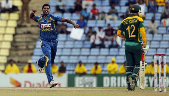 Sri Lanka`s Thisara Perera celebrates taking the wicket of South Africa`s Quinton de Kock during their third One Day International (ODI) cricket match in Pallekele, Sri Lanka.