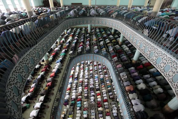 Bangladeshi Muslims offer Friday prayers of Ramadan at Baitul Mukaram national mosque in Dhaka.