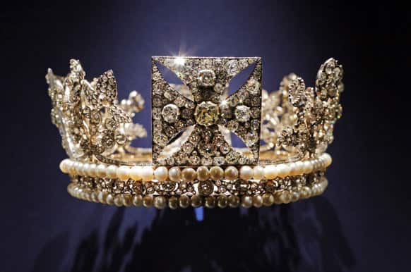 The diamond diadem, made of diamonds, pearls, silver and gold, worn by Britain`s Queen Elizabeth II on her way from Buckingham Palace to Westminster Abbey for her 1953 Coronation, is displayed at the exhibition