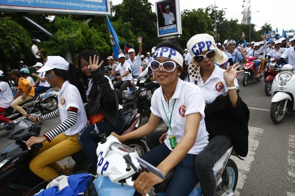 Supporters of Prime Minister Hun Sen`s Cambodian People`s Party hold a rally during the final campaign for the July 28 general election in Phnom Penh, Cambodia.