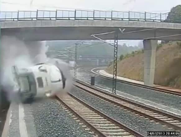 This image taken from security camera video shows a train derailing in Santiago de Compostela, Spain.