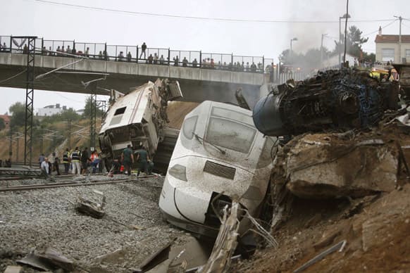 Emergency personnel respond to the scene of a train derailment in Santiago de Compostela, Spain.