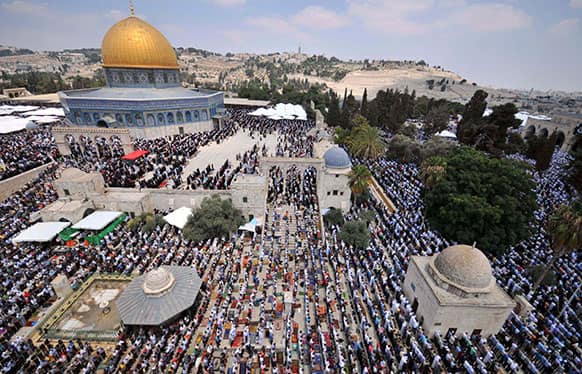 Palestinians pray at al-Aqsa Mosque compound during a holy Muslim month of Ramadan in Jerusalem.