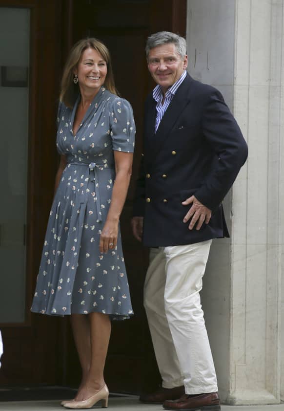 Carole and Michael Middleton, the parents of Kate, Duchess of Cambridge, smiles as they arrive at St. Mary`s Hospital exclusive Lindo Wing in London where the Duchess gave birth on Monday July 22nd.