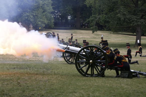 The King`s Troop Royal Horse Artillery fire a 41 Royal Gun Salute at Green Park in London to mark the birth of a baby boy to Prince William and Kate, Duchess of Cambridge.