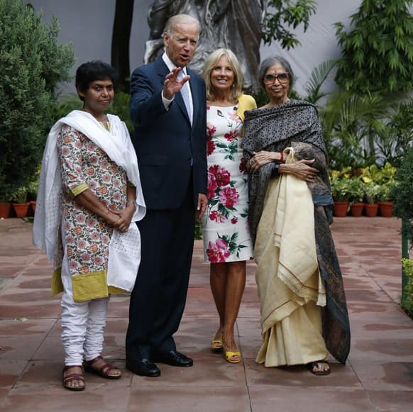 US Vice President Joe Biden and his wife Jill, pose for a photograph with museum director Manimala and Mahatma Gandhi’s granddaughter Tara Gandhi, during a visit to the Mahatma Gandhi museum in New Delhi.