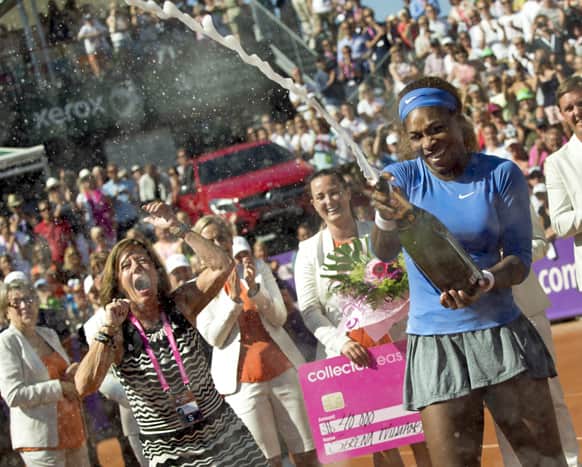 Serena Williams celebrates after winning her 53rd WTA title by beating Johanna Larsson, not shown, by 6-4, 6-1 in the final of the Swedish Open.