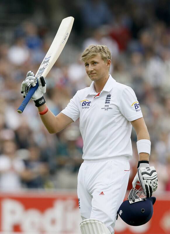 England`s Joe Root leaves the pitch on 180 runs after being caught off the bowling of Australia`s Ryan Harris during day four of the second Ashes Test match at Lord`s cricket ground in London.